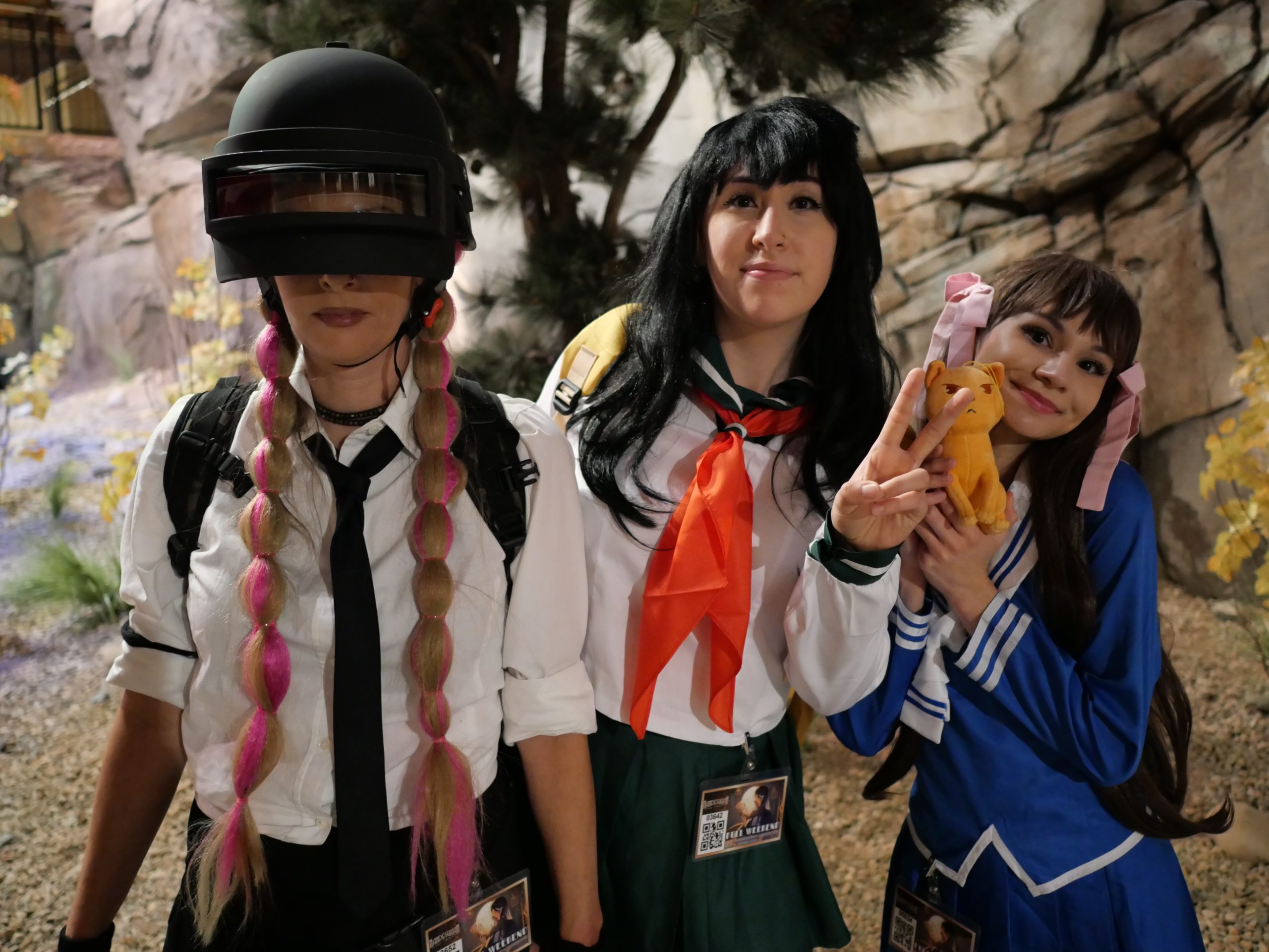 Kelsey and her mom and sister dressed up in cosplay.